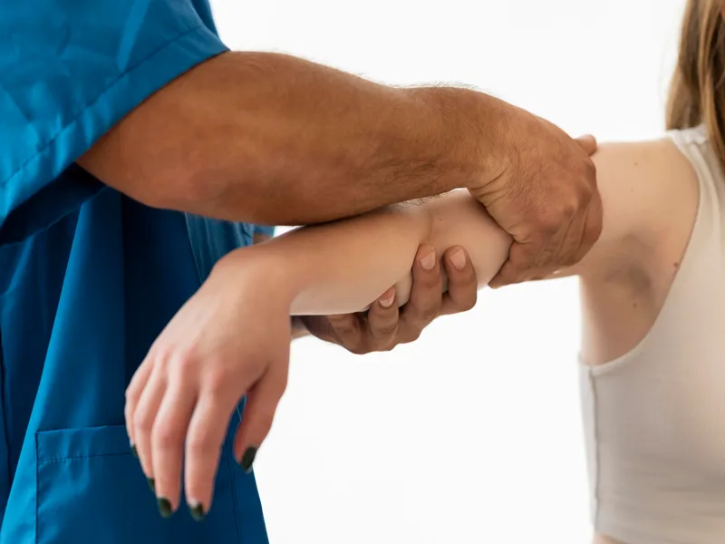 Chiropractic care for elbow pain at New Beginnings Chiropractic in Hudsonville